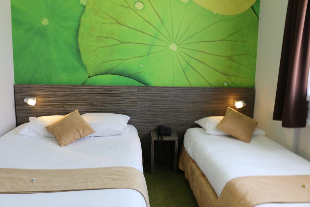 The Originals City, Hotel Dau Ly, Lyon Est Bron Bagian luar foto